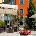 Treat yourself to a relaxing time in the garden of Falck Village Hotel in Sesto San Giovanni